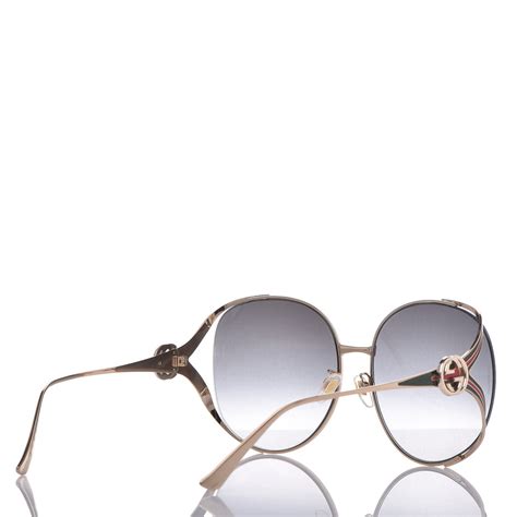 gucci round-frame gold-tone sunglasses|Gucci women's oversize round sunglasses.